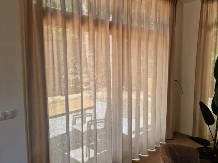 Vakantiewoning met inbetween gordijnen